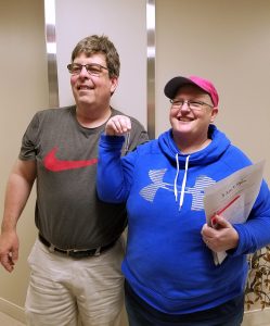 Deb with her whistle and her husband David on her last day of chemotherapy. 