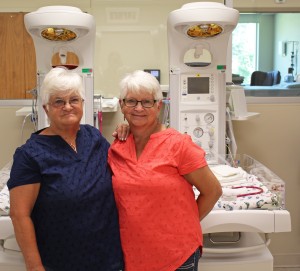 Carolyn Kaye (Ensley) Hauschen and Evelyn Raye (Ensley) Thull are pictured in front of the Obstetrics department at BVRMC.